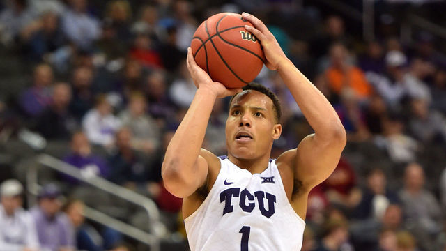 KANSAS CITY, MISSOURI - MARCH 11: Desmond Bane #1 of the TCU Horned Frogs shoots over Mike McGuirl #00 of the Kansas State Wildcats in the second half during the first round of the Big 12 Basketball Tournament at Sprint Center on March 11, 2020 in Kansas City, Missouri.