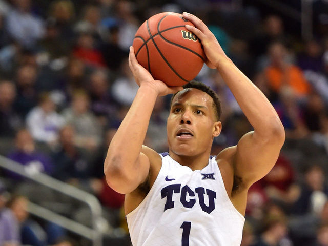 KANSAS CITY, MISSOURI - MARCH 11: Desmond Bane #1 of the TCU Horned Frogs shoots over Mike McGuirl #00 of the Kansas State Wildcats in the second half during the first round of the Big 12 Basketball Tournament at Sprint Center on March 11, 2020 in Kansas City, Missouri.