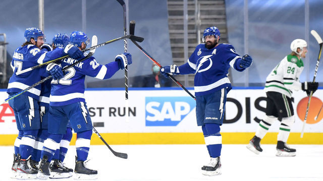 EDMONTON, ALBERTA - SEPTEMBER 21: Kevin Shattenkirk #22 of the Tampa Bay Lightning celebrates with Alex Killorn #17, Anthony Cirelli #71, Blake Coleman #20 and Ryan McDonagh #27 as Joel Kiviranta #25 of the Dallas Stars skates to the bench after Shattenkirk scored in the first period of Game Two of the NHL Stanley Cup Final between the Dallas Stars and the Tampa Bay Lightning at Rogers Place on September 21, 2020 in Edmonton, Alberta, Canada.