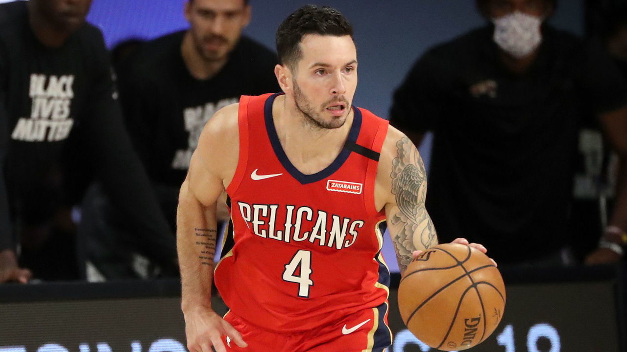 Orlando, FL - AUGUST 3: JJ Redick #4 of the New Orleans Pelicans handles the ball during the game against the Memphis Grizzlies on August 3, 2020 at The Visa Athletic Center at ESPN Wide World Of Sports Complex in Reunion, Florida. NOTE TO USER: User expressly acknowledges and agrees that, by downloading and/or using this Photograph, user is consenting to the terms and conditions of the Getty Images License Agreement. Mandatory Copyright Notice: Copyright 2020 NBAE