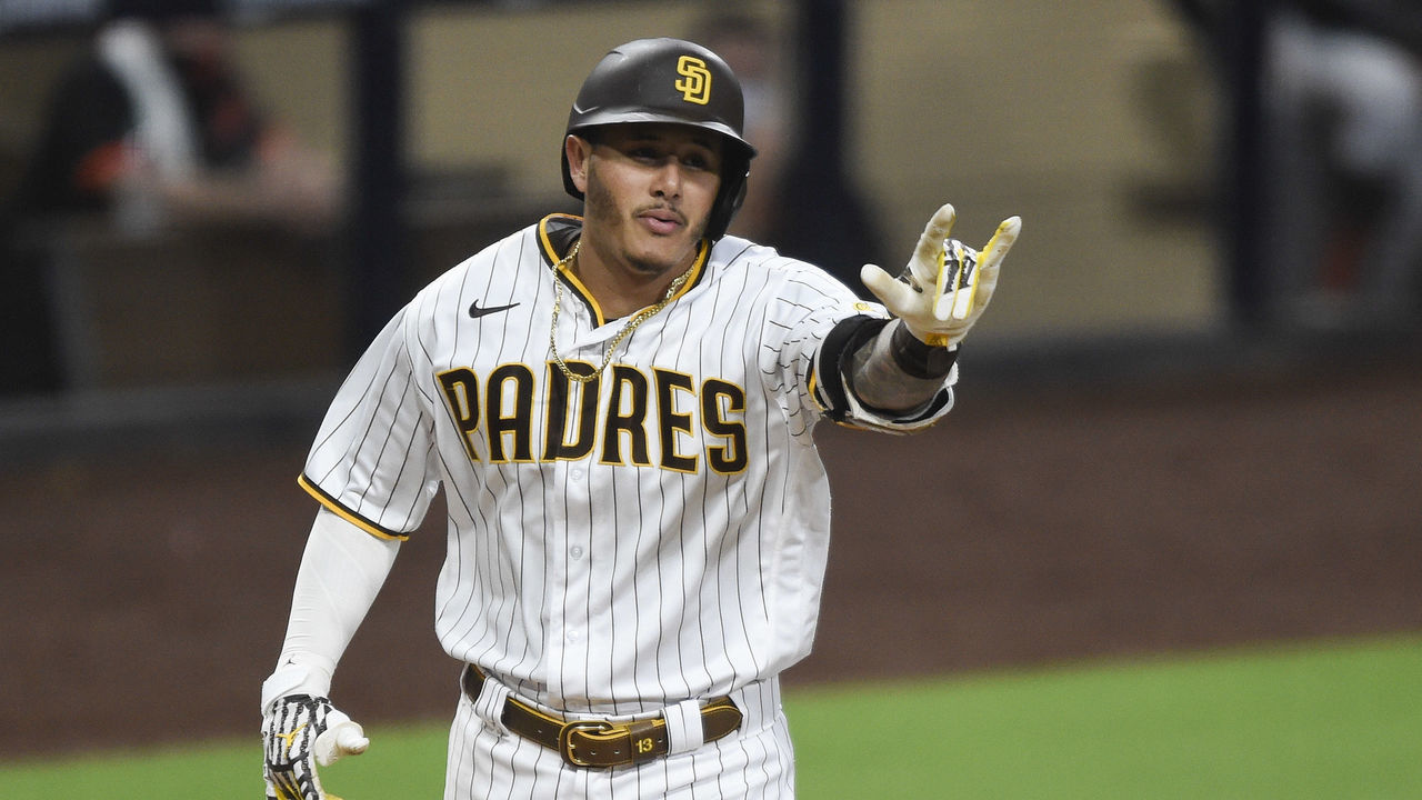 SAN DIEGO, CA - SEPTEMBER 10: Manny Machado #13 of the San Diego Padres celebrates after hitting a solo home run during the third inning of a baseball game against the San Francisco Giants at Petco Park on September 10, 2020 in San Diego, California.