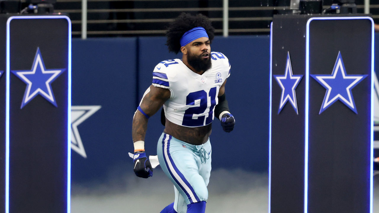 ARLINGTON, TEXAS - SEPTEMBER 20: Ezekiel Elliott #21 of the Dallas Cowboys takes the field during player introductions before the Dallas Cowboys take on the Atlanta Falcons at AT&T Stadium on September 20, 2020 in Arlington, Texas.