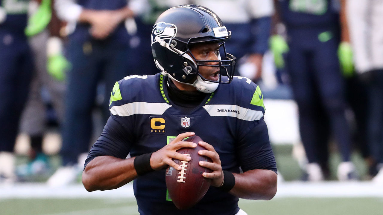 SEATTLE, WASHINGTON - SEPTEMBER 20: Russell Wilson #3 of the Seattle Seahawks looks to pass during the first half against the New England Patriots at CenturyLink Field on September 20, 2020 in Seattle, Washington.