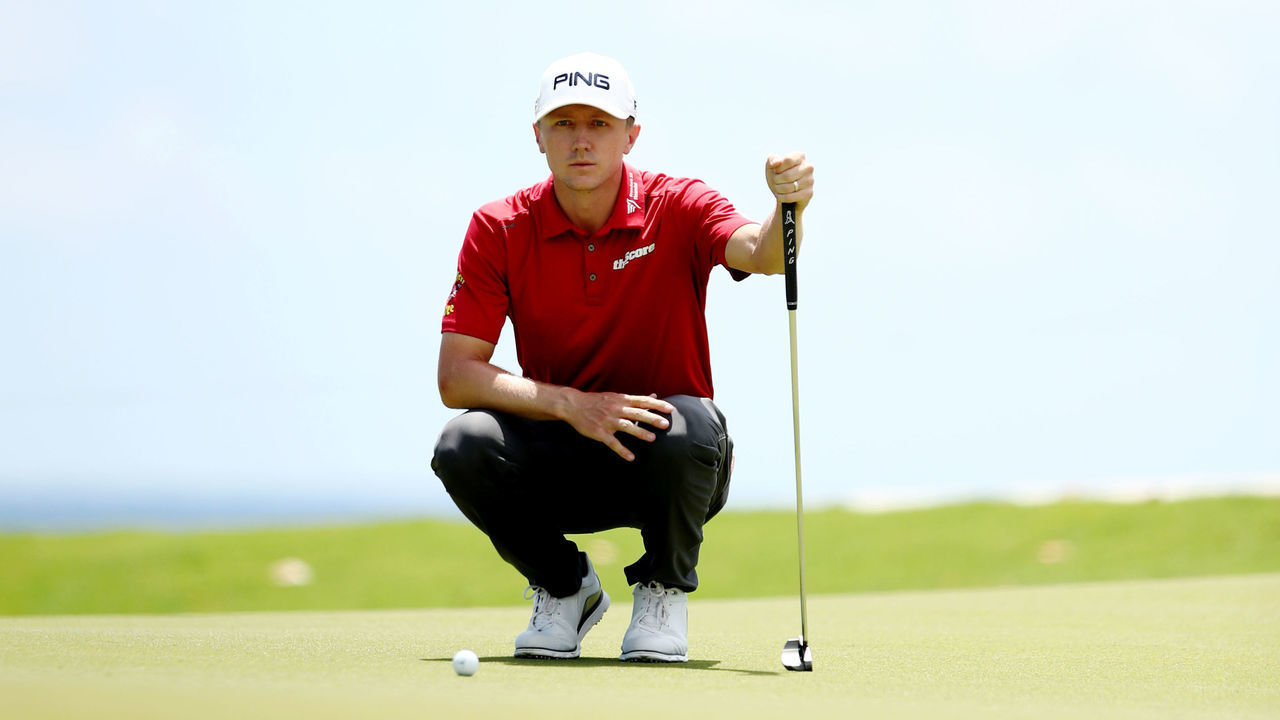 PUNTA CANA, DOMINICAN REPUBLIC - MARCH 31: Mackenzie Hughes of Canada lines up a putt on the first green during the final round of the Corales Puntacana Resort & Club Championship on March 31, 2019 in Punta Cana, Dominican Republic.
