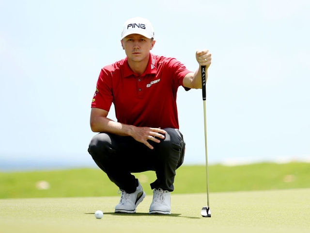PUNTA CANA, DOMINICAN REPUBLIC - MARCH 31: Mackenzie Hughes of Canada lines up a putt on the first green during the final round of the Corales Puntacana Resort & Club Championship on March 31, 2019 in Punta Cana, Dominican Republic.