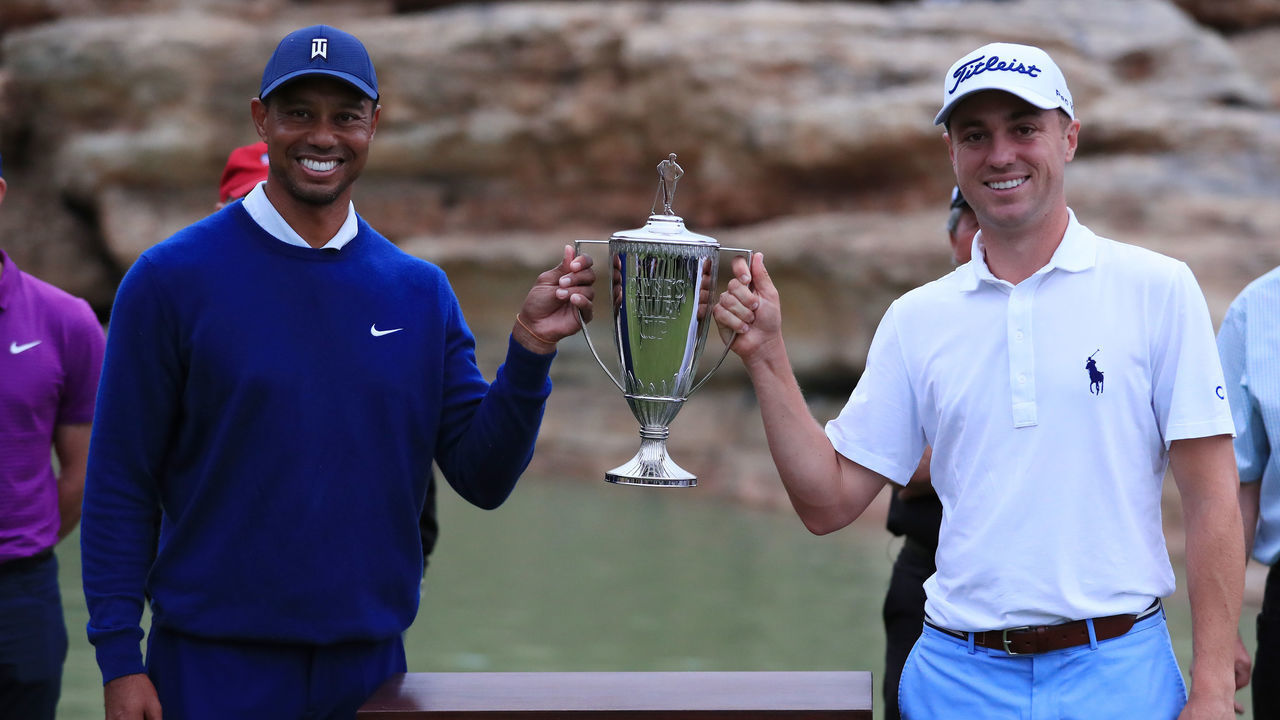 RIDGEDALE, MISSOURI - SEPTEMBER 22: Tiger Woods of the United States and Justin Thomas of the United States celebrate with the trophy on the 19th green after defeating Rory McIlroy of Northern Ireland and Justin Rose of England in the Payne’s Valley Cup on September 22, 2020 on the Payne’s Valley course at Big Cedar Lodge in Ridgedale, Missouri.