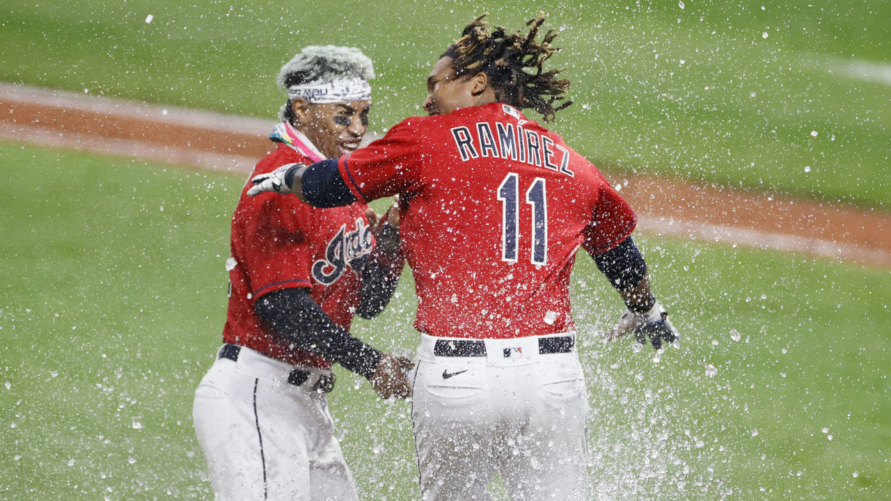 CLEVELAND, OH - SEPTEMBER 22: Jose Ramirez #11 of the Cleveland Indians celebrates with Francisco Lindor #12 after hitting a walk-off three-run home run off José Ruiz #66 of the Chicago White Sox during the tenth inning at Progressive Field on September 22, 2020 in Cleveland, Ohio. The Indians defeated the White Sox 5-3.