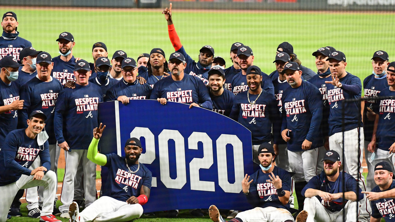 ATLANTA, GA. - SEPTEMBER 22: Members of the Atlanta Braves celebrate after winning the NL East Division title against the Miami Marlins at Truist Park on September 22, 2020 in Atlanta, Georgia.