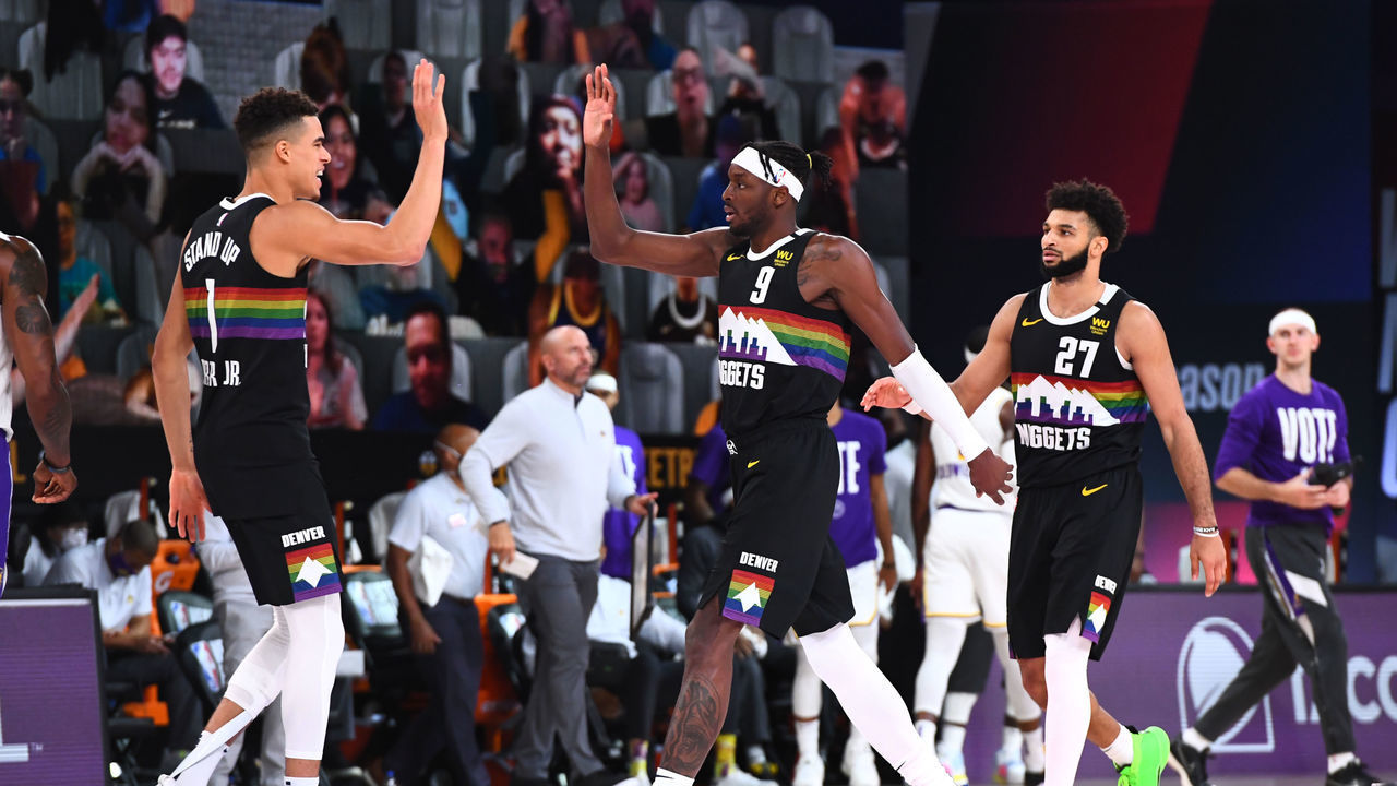 ORLANDO, FL - SEPTEMBER 22: Michael Porter Jr. #1 high-fives Jerami Grant #9 of the Denver Nuggets during Game Three of the Western Conference Finals of the NBA Playoffs on September 22, 2020 at AdventHealth Arena in Orlando, Florida. NOTE TO USER: User expressly acknowledges and agrees that, by downloading and/or using this Photograph, user is consenting to the terms and conditions of the Getty Images License Agreement. Mandatory Copyright Notice: Copyright 2020 NBAE