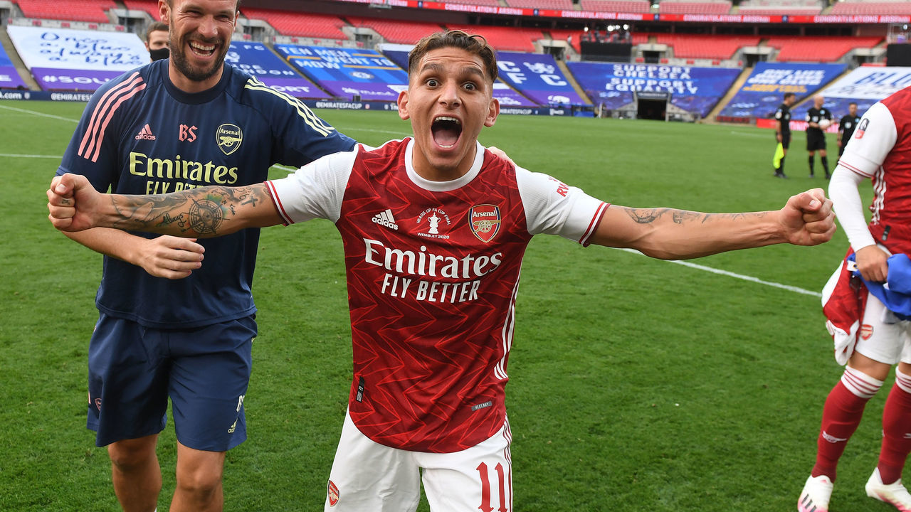 LONDON, ENGLAND - AUGUST 01: Lucas Torreira and Arsenal Fitness coach Barry Solan after the FA Cup Final match between Arsenal and Chelsea at Wembley Stadium on August 01, 2020 in London, England. Football Stadiums around Europe remain empty due to the Coronavirus Pandemic as Government social distancing laws prohibit fans inside venues resulting in all fixtures being played behind closed doors.