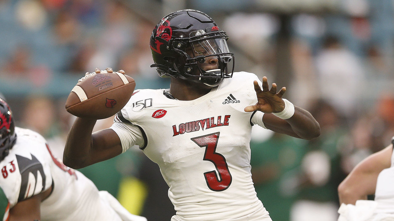 MIAMI, FLORIDA - NOVEMBER 09: Micale Cunningham #3 of the Louisville Cardinals in action against the Miami Hurricanes at Hard Rock Stadium on November 09, 2019 in Miami, Florida.