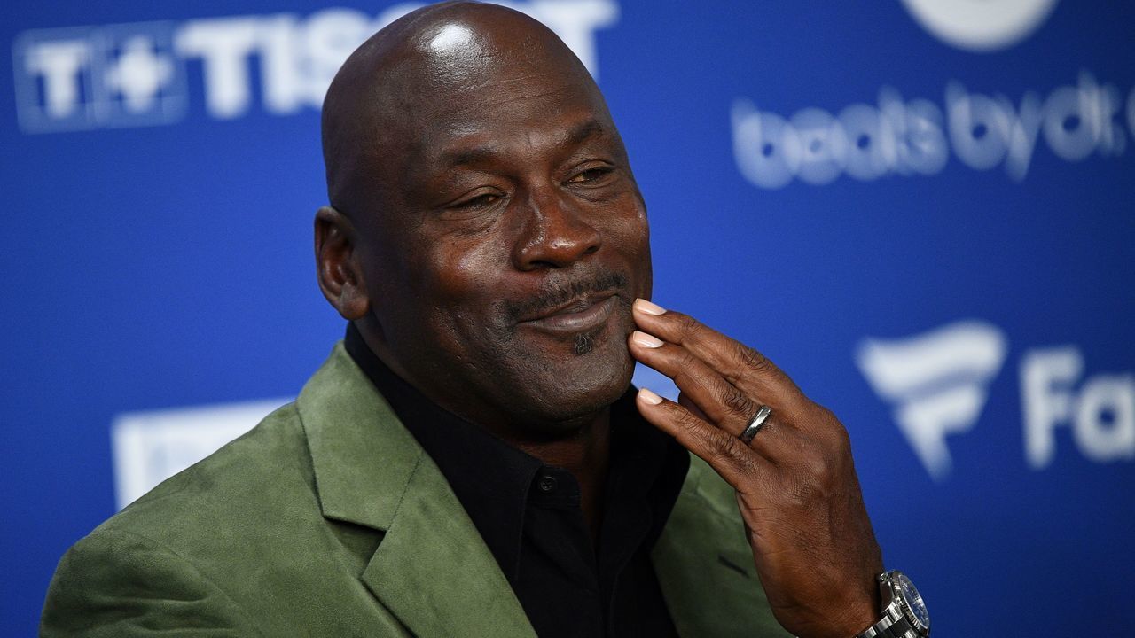 Former NBA star and owner of Charlotte Hornets team Michael Jordan looks on as he addresses a press conference ahead of the NBA basketball match between Milwaukee Bucks and Charlotte Hornets at The AccorHotels Arena in Paris on January 24, 2020.