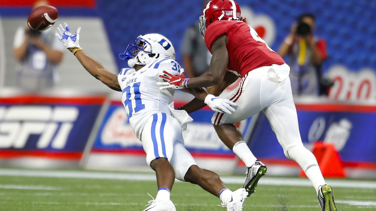 ATLANTA, GA - AUGUST 31: Duke Blue Devils cornerback Josh Blackwell (31) just misses an interception as the ball is overthrown to Alabama Crimson Tide wide receiver Jerry Jeudy (4) has the ball just off his fingertips in the first half of the Duke Blue Devils v Alabama Crimson Tide game August 31, 2019 at Mercedes-Benz Stadium in Atlanta, GA.