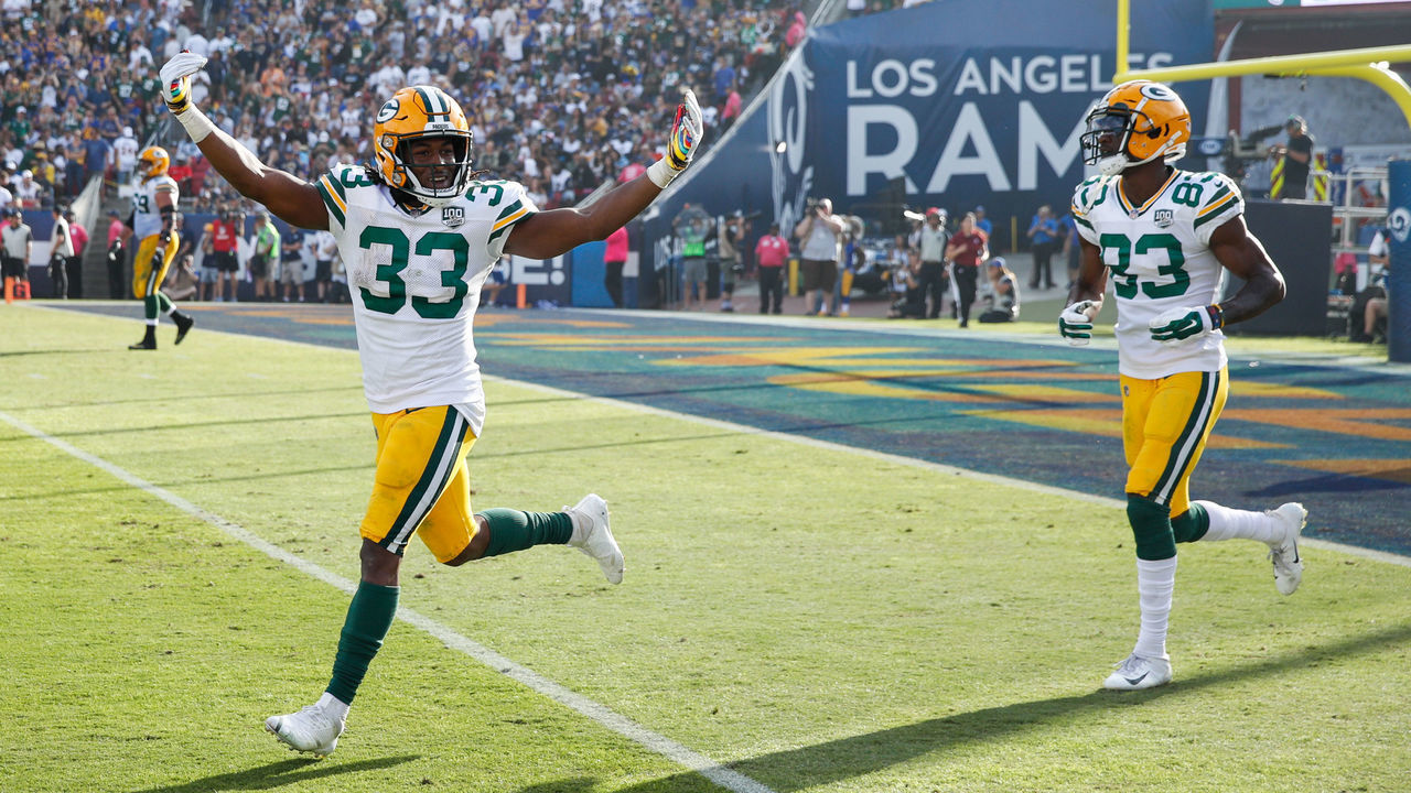 LOS ANGELES, CA - OCTOBER 28: Running back Aaron Jones #33 of the Green Bay Packers celebrates in the game against the Los Angeles Rams at Los Angeles Memorial Coliseum on October 28, 2018 in Los Angeles, California.