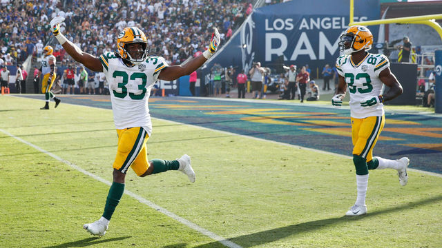LOS ANGELES, CA - OCTOBER 28: Running back Aaron Jones #33 of the Green Bay Packers celebrates in the game against the Los Angeles Rams at Los Angeles Memorial Coliseum on October 28, 2018 in Los Angeles, California.