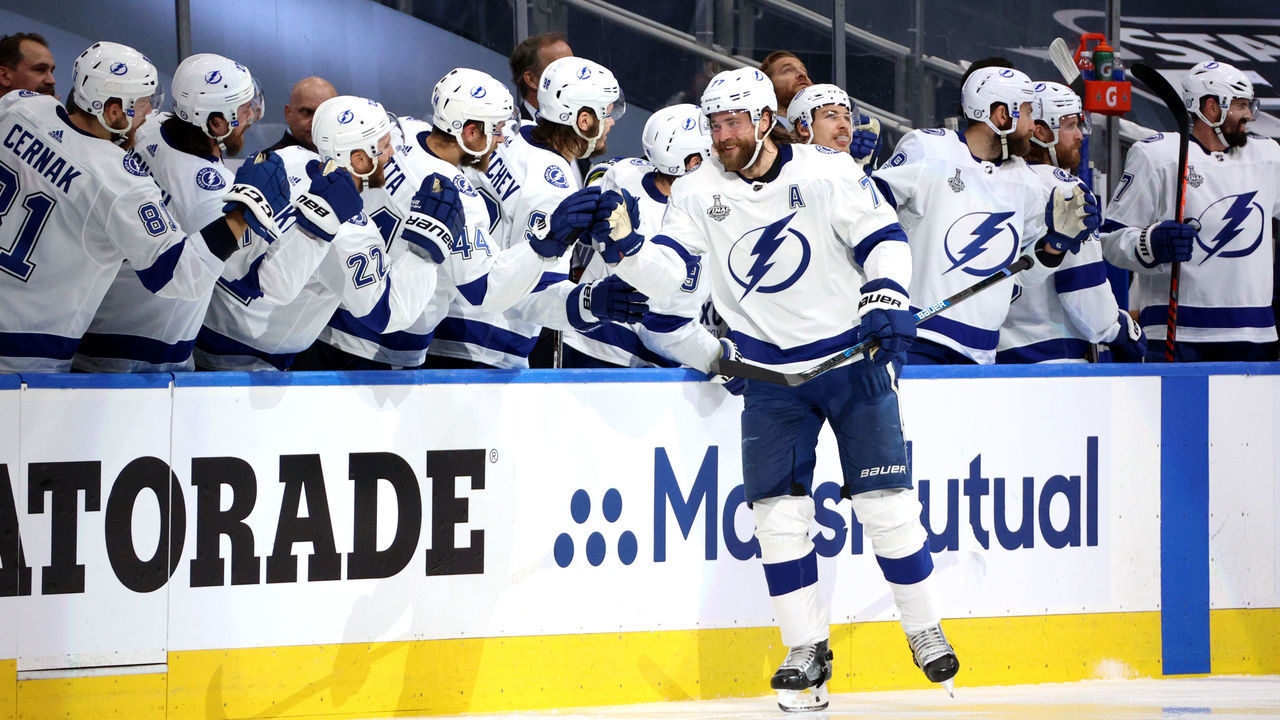 EDMONTON, ALBERTA - SEPTEMBER 23: Victor Hedman #77 of the Tampa Bay Lightning celebrates with teammates on the bench after scoring in the second period of Game Three of the NHL Stanley Cup Final between the Tampa Bay Lightning and the Dallas Stars at Rogers Place on September 23, 2020 in Edmonton, Alberta, Canada.