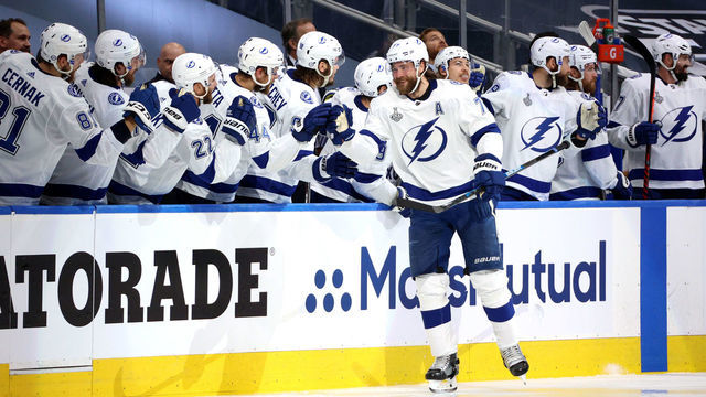EDMONTON, ALBERTA - SEPTEMBER 23: Victor Hedman #77 of the Tampa Bay Lightning celebrates with teammates on the bench after scoring in the second period of Game Three of the NHL Stanley Cup Final between the Tampa Bay Lightning and the Dallas Stars at Rogers Place on September 23, 2020 in Edmonton, Alberta, Canada.