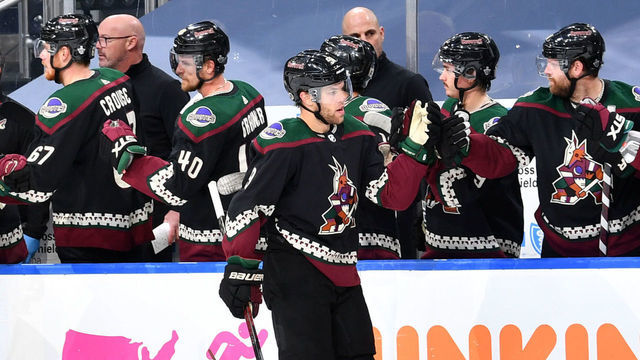 EDMONTON, ALBERTA - AUGUST 15: Taylor Hall #91 of the Arizona Coyotes celebrates his empty net goal against the Colorado Avalanche with teammates during the third period of Game Three of the Western Conference First Round of the 2020 NHL Stanley Cup Playoff at Rogers Place on August 15, 2020 in Edmonton, Alberta.