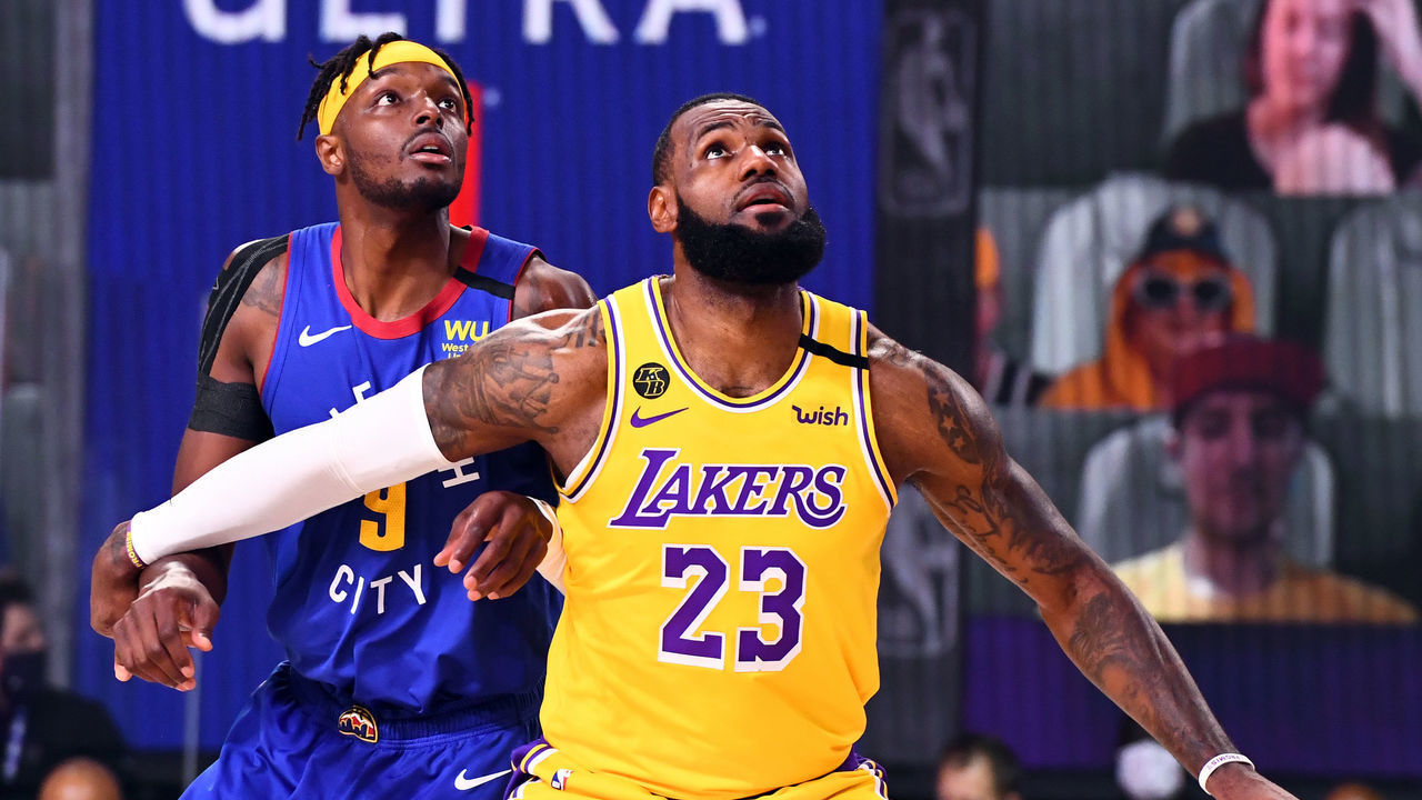 ORLANDO, FL - SEPTEMBER 18: LeBron James #23 of the Los Angeles Lakers and Jerami Grant #9 of the Denver Nuggets look for the ball during Game One of the Western Conference Finals of the NBA Playoffs on September 18, 2020 at The AdventHealth Arena at ESPN Wide World Of Sports Complex in Orlando, Florida. NOTE TO USER: User expressly acknowledges and agrees that, by downloading and/or using this Photograph, user is consenting to the terms and conditions of the Getty Images License Agreement. Mandatory Copyright Notice: Copyright 2020 NBAE