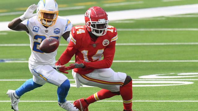 INGLEWOOD, CALIFORNIA - SEPTEMBER 20: Wide receiver Sammy Watkins #14 of the Kansas City Chiefs drops a pass in front of cornerback Casey Hayward #26 of the Los Angeles Chargers during the third quarter at SoFi Stadium on September 20, 2020 in Inglewood, California.