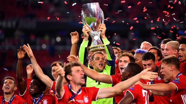 BUDAPEST, HUNGARY - SEPTEMBER 24: Manuel Neuer of Bayern Munich lifts the UEFA Super Cup trophy as he celebrates victory over FC Sevilla at Puskas Arena on September 24, 2020 in Budapest, Hungary. 20,000 fans have been allowed into the ground as COVID-19 restrictions ease.