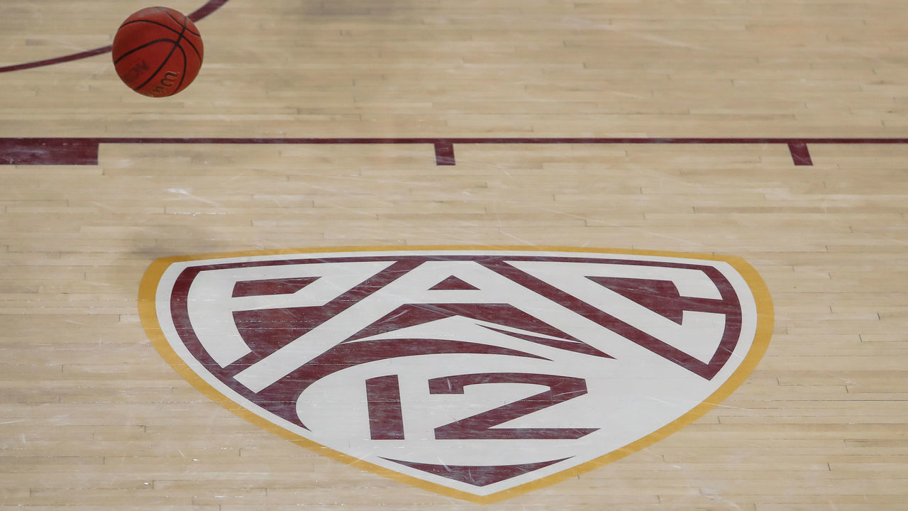 TEMPE, AZ - NOVEMBER 17: The PAC 12 logo on the court with a basketball before the college basketball game between the Rider Broncs and the Arizona State Sun Devils on November 17, 2019 at Desert Financial Arena in Tempe, Arizona.