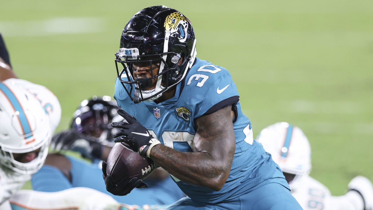 JACKSONVILLE, FLORIDA - SEPTEMBER 24: James Robinson #30 of the Jacksonville Jaguars rushes for a touchdown during the second quarter of a game against the Miami Dolphins at TIAA Bank Field on September 24, 2020 in Jacksonville, Florida.