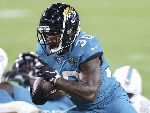 JACKSONVILLE, FLORIDA - SEPTEMBER 24: James Robinson #30 of the Jacksonville Jaguars rushes for a touchdown during the second quarter of a game against the Miami Dolphins at TIAA Bank Field on September 24, 2020 in Jacksonville, Florida.