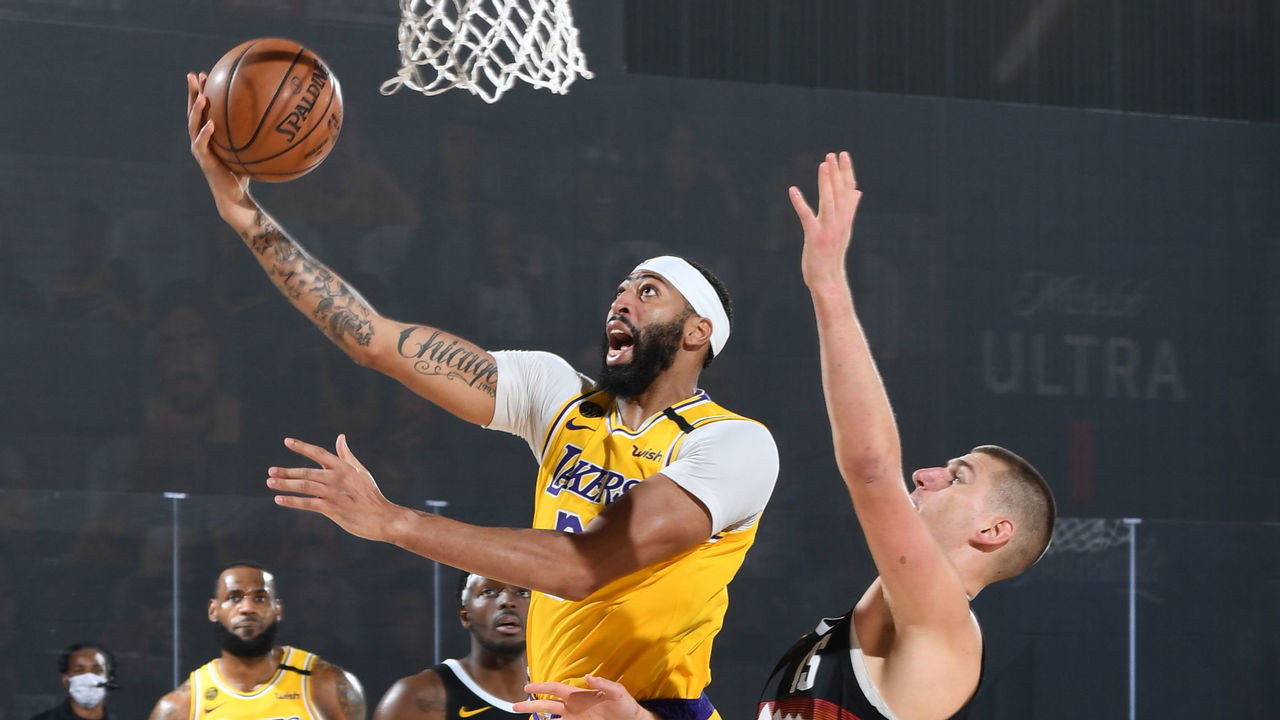 ORLANDO, FL - SEPTEMBER 24: Anthony Davis #3 of the Los Angeles Lakers shoots the ball against the Denver Nuggets during Game Four of the Western Conference Finals on September 24, 2020 in Orlando, Florida at AdventHealth Arena. NOTE TO USER: User expressly acknowledges and agrees that, by downloading and/or using this Photograph, user is consenting to the terms and conditions of the Getty Images License Agreement. Mandatory Copyright Notice: Copyright 2020 NBAE