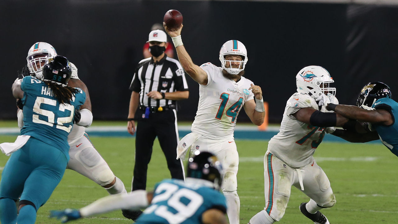 JACKSONVILLE, FL - SEPTEMBER 24: Miami Dolphins Quarterback Ryan Fitzpatrick (14) throws a pass during the game between the Miami Dolphins and the Jacksonville Jaguars on. September 24, 2020 at TIAA Bank Field in Jacksonville, Fl.