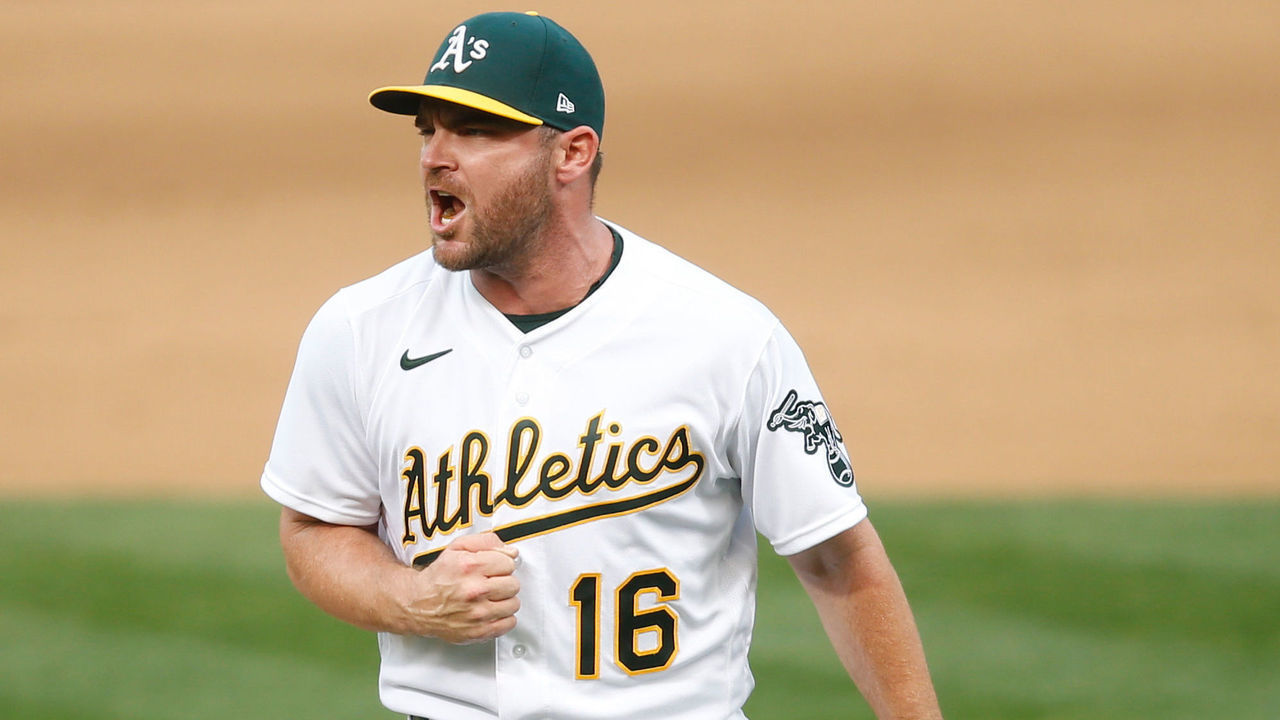 OAKLAND, CA - SEPTEMBER 8: Liam Hendriks #16 of the Oakland Athletics celebrates on the field following the game against the Houston Astros at RingCentral Coliseum on September 8, 2020 in Oakland, California. The Athletics defeated the Astros 4-2.