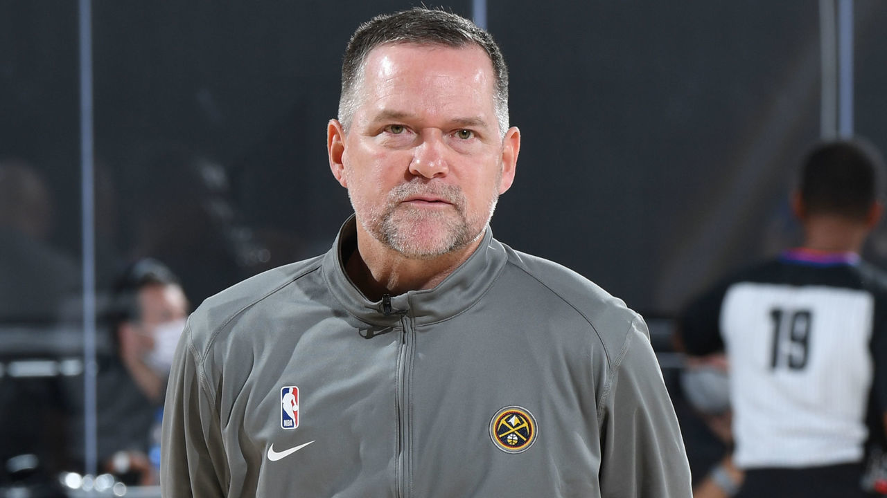 ORLANDO, FL - SEPTEMBER 24: ESPN Reporter Allie LaForce interviews Head Coach Michael Malone of the Denver Nuggets during the game against the Los Angeles Lakers during Game Four of the Western Conference Finals on September 24, 2020 in Orlando, Florida at AdventHealth Arena. NOTE TO USER: User expressly acknowledges and agrees that, by downloading and/or using this Photograph, user is consenting to the terms and conditions of the Getty Images License Agreement. Mandatory Copyright Notice: Copyright 2020 NBAE