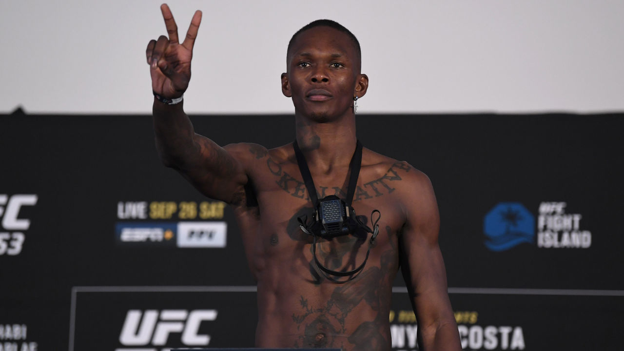 ABU DHABI, UNITED ARAB EMIRATES - SEPTEMBER 25: Israel Adesanya of Nigeria poses on the scale during the UFC 253 weigh-in on September 25, 2020 at Flash Forum on UFC Fight Island, Abu Dhabi, United Arab Emirates.
