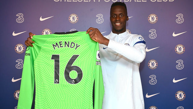 COBHAM, ENGLAND - SEPTEMBER 24: Edouard Mendy of Chelsea poses with his shirt at Chelsea Training Ground on September 24, 2020 in Cobham, England.