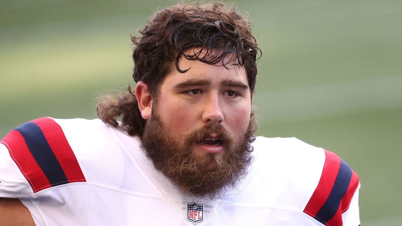 SEATTLE, WASHINGTON - SEPTEMBER 20: David Andrews #60 of the New England Patriots looks on in the first quarter against the Seattle Seahawks at CenturyLink Field on September 20, 2020 in Seattle, Washington.