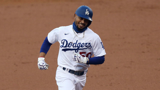 LOS ANGELES, CA - AUGUST 17: Los Angeles Dodgers right fielder Mookie Betts (50) rounds second base after hitting a solo home, run during the game against the Seattle Mariners on August 17, 2020, at Dodger Stadium in Los Angeles, CA.