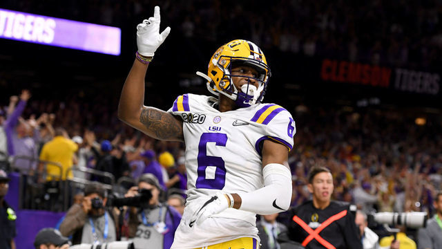 NEW ORLEANS, LA - JANUARY 13: Terrace Marshall Jr. #6 of the LSU Tigers celebrates after scoring a touchdown against the Clemson Tigers during the College Football Playoff National Championship held at the Mercedes-Benz Superdome on January 13, 2020 in New Orleans, Louisiana.
