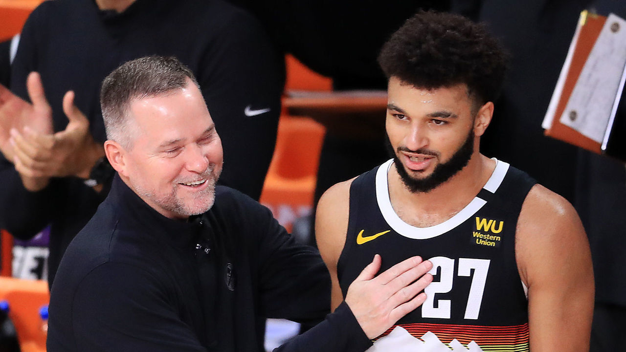 LAKE BUENA VISTA, FLORIDA - SEPTEMBER 13: Michael Malone of the Denver Nuggets reacts with Jamal Murray #27 of the Denver Nuggets during the fourth quarter against the LA Clippers in Game Six of the Western Conference Second Round during the 2020 NBA Playoffs at AdventHealth Arena at the ESPN Wide World Of Sports Complex on September 12, 2020 in Lake Buena Vista, Florida.