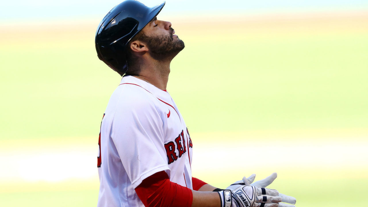 BOSTON, MASSACHUSETTS - SEPTEMBER 20: J.D. Martinez #28 of the Boston Red Sox celebrates after hitting a home run against the New York Yankees during the eighth inning at Fenway Park on September 20, 2020 in Boston, Massachusetts.