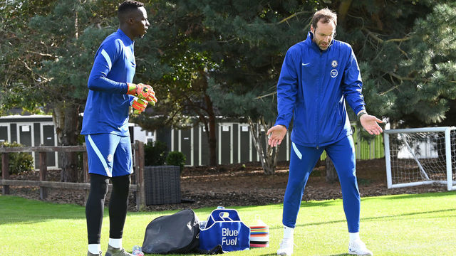 COBHAM, ENGLAND - SEPTEMBER 25: Petr Cech of Chelsea talks to Edouard Mendy of Chelsea during an individual training session at Chelsea Training Ground on September 25, 2020 in Cobham, England.