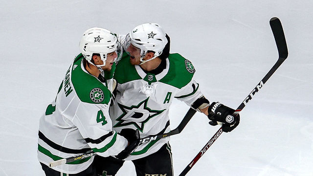 EDMONTON, ALBERTA - SEPTEMBER 04: Miro Heiskanen #4 and John Klingberg #3 of the Dallas Stars celebrate the game-winning goal by teammate Joel Kiviranta (not pictured) against the Colorado Avalanche during the first overtime period to win Game Seven of the Western Conference Second Round during the 2020 NHL Stanley Cup Playoffs at Rogers Place on September 04, 2020 in Edmonton, Alberta, Canada.