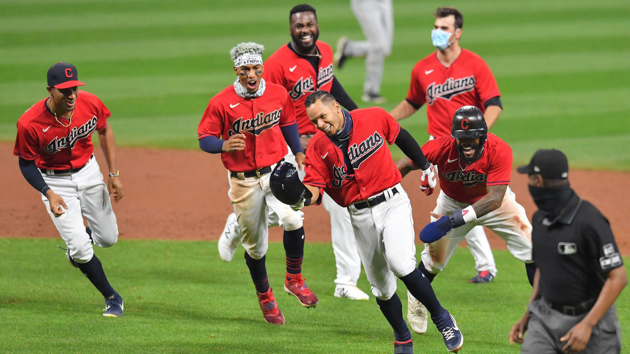 CLEVELAND, OHIO - SEPTEMBER 25: Cesar Hernandez #7 of the Cleveland Indians celebrates with his teammates after hitting a walk-off RBI single during the ninth inning against the Pittsburgh Pirates at Progressive Field on September 25, 2020 in Cleveland, Ohio. The Indians defeated the Pirates 4-3.