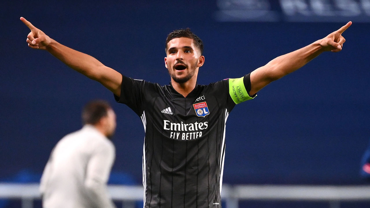 LISBON, PORTUGAL - AUGUST 15: Houssem Aouar of Olympique Lyon celebrates following his team's victory in the UEFA Champions League Quarter Final match between Manchester City and Lyon at Estadio Jose Alvalade on August 15, 2020 in Lisbon, Portugal.
