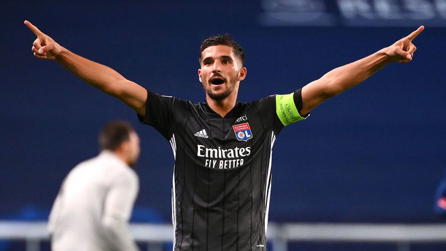 LISBON, PORTUGAL - AUGUST 15: Houssem Aouar of Olympique Lyon celebrates following his team's victory in the UEFA Champions League Quarter Final match between Manchester City and Lyon at Estadio Jose Alvalade on August 15, 2020 in Lisbon, Portugal.