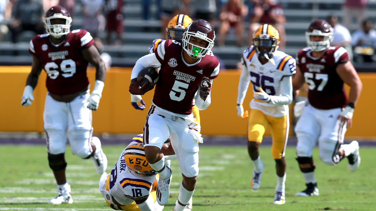 BATON ROUGE, LOUISIANA - SEPTEMBER 26: Osirus Mitchell #5 of the Mississippi State Bulldogs is tackled by Damone Clark #18 of the LSU Tigers during a NCAA football game at Tiger Stadium on September 26, 2020 in Baton Rouge, Louisiana.