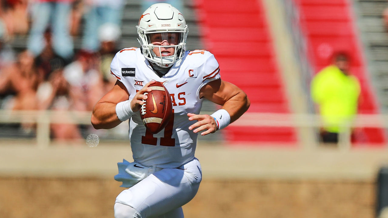 LUBBOCK, TEXAS - SEPTEMBER 26: Quarterback Sam Ehlinger #11 of the Texas Longhorns scrambles during the first half of the college football game against the Texas Tech Red Raiders on September 26, 2020 at Jones AT&T Stadium in Lubbock, Texas.