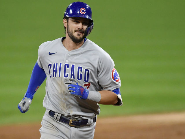 CHICAGO, ILLINOIS - SEPTEMBER 26: Kris Bryant #17 of the Chicago Cubs hits a grand slam home run in the third inning against the Chicago White Sox at Guaranteed Rate Field on September 26, 2020 in Chicago, Illinois.