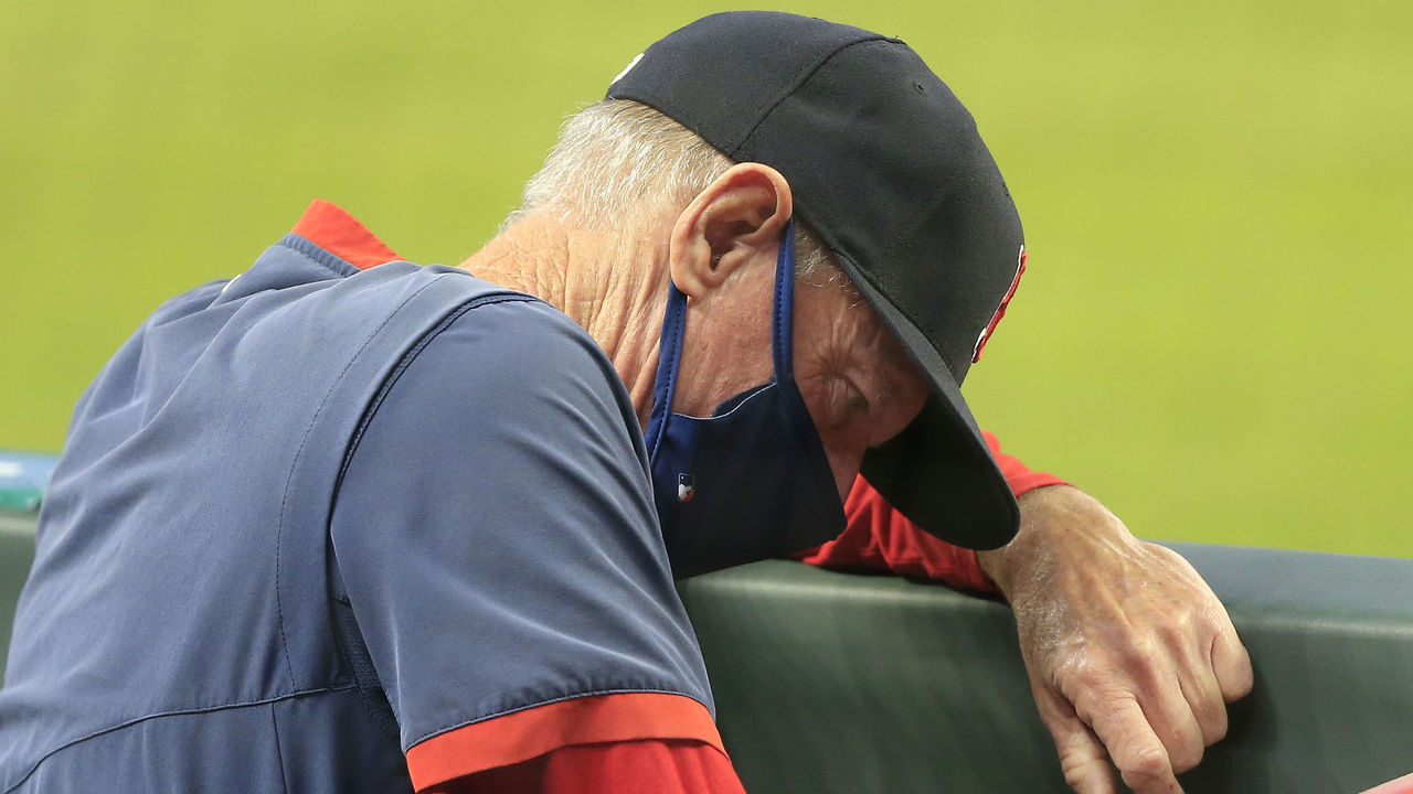 ATLANTA, GA - SEPTEMBER 26: Red Sox manager Ron Roenicke looks on from the dugout during the interleague MLB game between the Atlanta Braves and the Boston Red Sox on September 26, 2020 at Truist Park in Atlanta, Georgia.