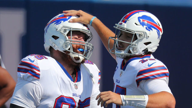 ORCHARD PARK, NY - SEPTEMBER 27: Josh Allen #17 of the Buffalo Bills celebrates a touchdown by teammate Lee Smith #85 during the first half against the Los Angeles Rams at Bills Stadium on September 27, 2020 in Orchard Park, New York.