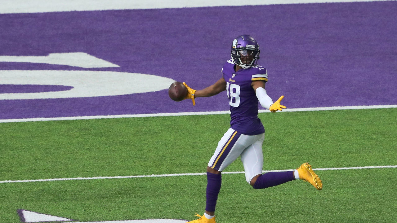 MINNEAPOLIS, MN - SEPTEMBER 27: Justin Jefferson #18 of the Minnesota Vikings scores a touchdown against the Tennessee Titans in the third quarter at U.S. Bank Stadium on September 27, 2020 in Minneapolis, Minnesota.